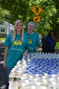 Jordan, left, and Courtney Smith of Bedminster handed out water bottles at Miles for Matheny 2014.
